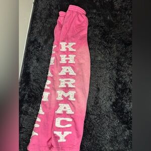 Pink Sweatpants with White Lettering